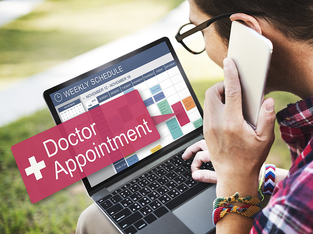 woman on phone to schedule appointments