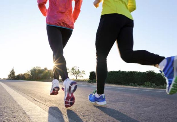 Two people running