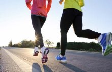 Two people running